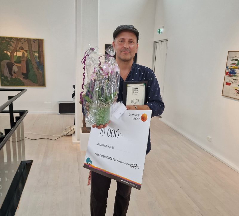 Peter med check och blommor